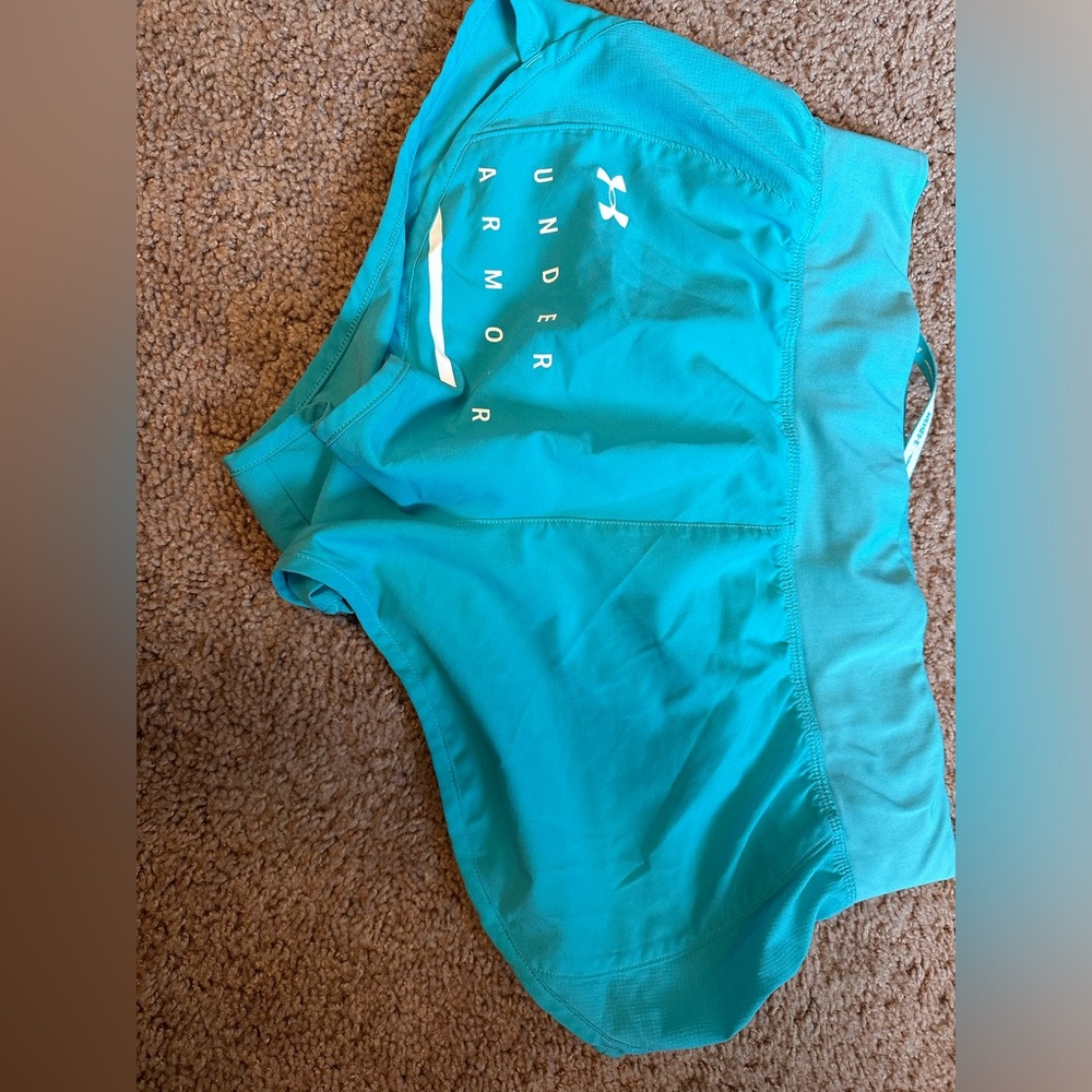 Size medium under armor shorts in good condition